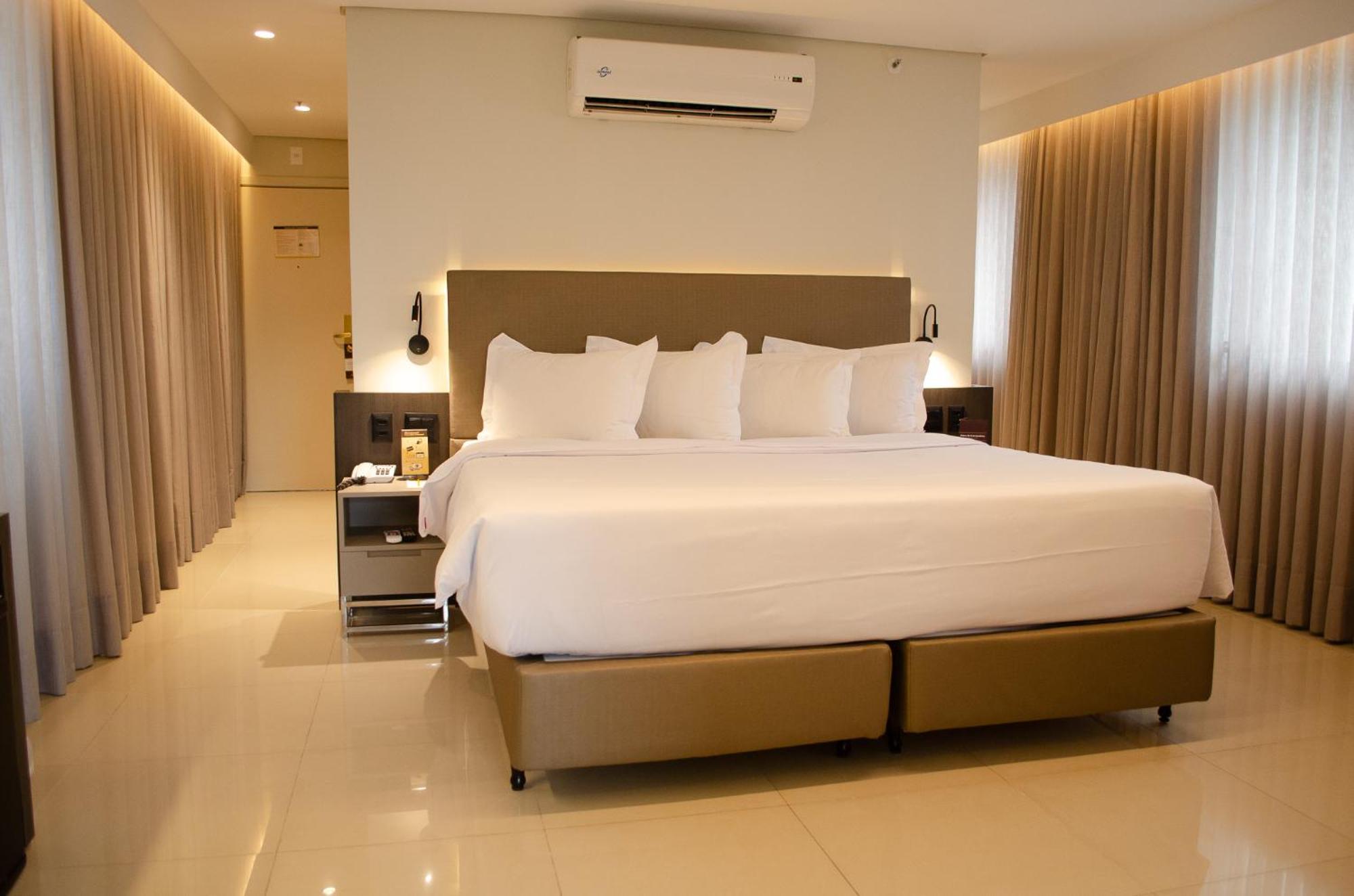 Royal Boutique Savassi Hotel Belo Horizonte Extérieur photo A bedroom at the hotel